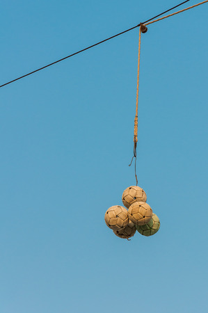 sepak takraw balls hang on cableの写真素材