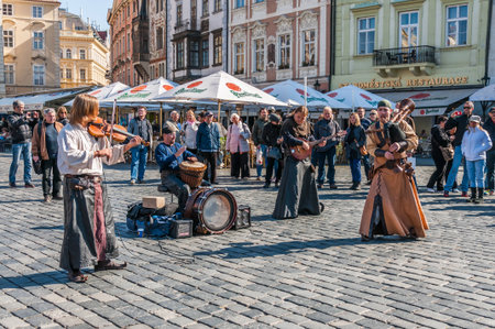 PRAGUE - OCT 01  Street artist at the Old Tow Square in Prague, Czech Republic on October 01, 2013 Prague is the capital of Czech Republic, receiving millions of tourists annually のeditorial素材