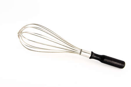 stainless whisk (egg beater) isolated on whiteの写真素材