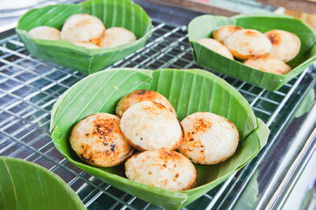 thai traditional coconut milk dessert on banana leafの写真素材