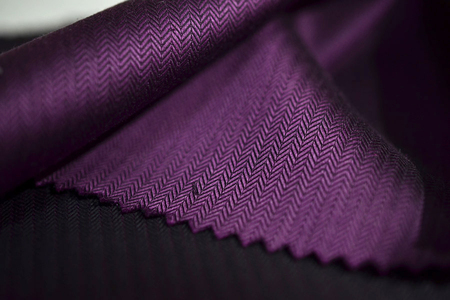 close up purple fabric of shirt, photo shoot by depth of field for object