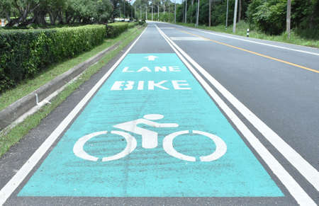 Safety symbol to indicate of bike lane on road for safe to biker man. Separate bicycle lane for...