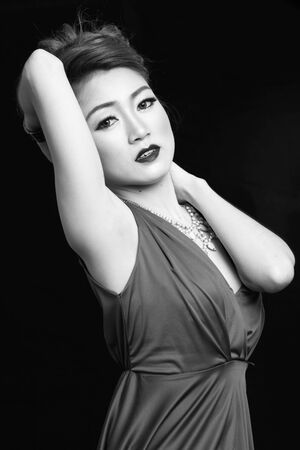 Editorial: Portrait of Asian lady poses in old fashion portrait styleのeditorial素材