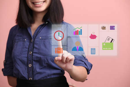 Beautiful Asian teen gesture virtual monitor information smileの写真素材