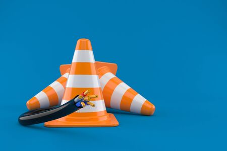 Traffic cone with electric cable isolated on blue backgroundの写真素材
