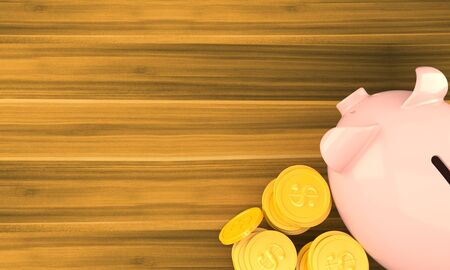 Piggy bank with stack of coins on wooden backgroundの写真素材