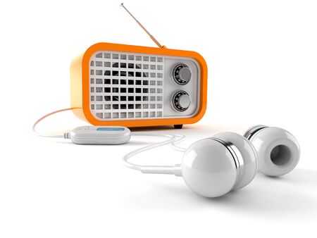 Radio with earphones isolated on white backgroundの写真素材