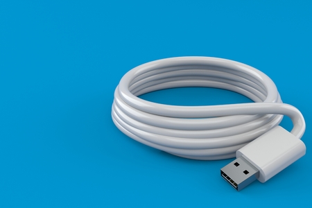 Reel of USB cable isolated on blue backgroundの写真素材