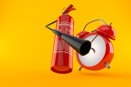 Fire extinguisher with alarm clock isolated on orange backgroundの写真素材