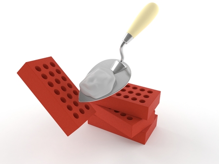 Bricks with trowel isolated on white backgroundの写真素材