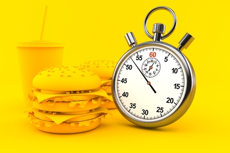 Fast food background with stopwatch in orange colorの写真素材