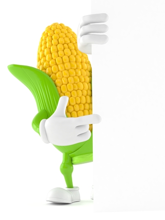 Corn character behind white wall isolated on white backgroundの写真素材