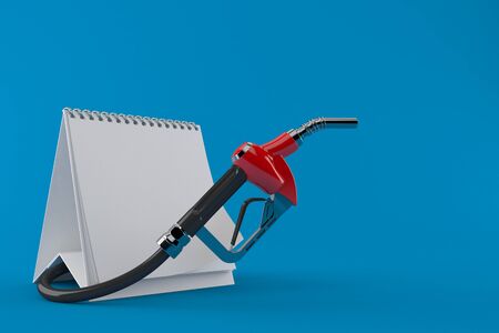 Gasoline nozzle with blank calendar isolated on blue backgroundの写真素材
