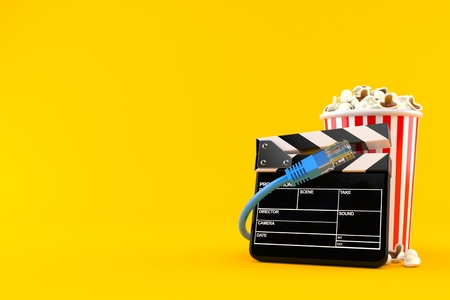 Popcorn and clapboard with network cable isolated on orange background. 3d illustrationの写真素材