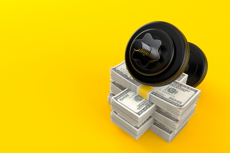 Dumbbell on stack of money isolated on orange background. 3d illustrationの写真素材