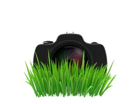 Camera on grass isolated on white background. 3d illustrationの写真素材