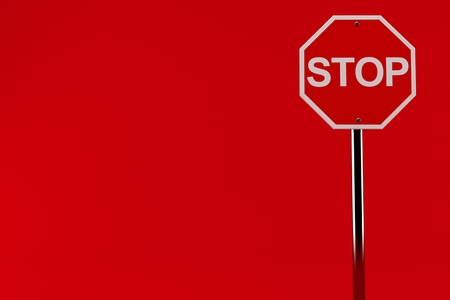 Stop road sign isolated on red background. 3d illustrationの写真素材