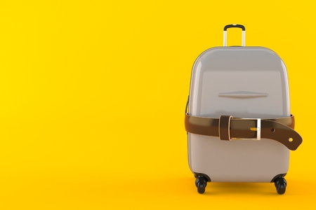Suitcase with tight belt isolated on orange background. 3d illustrationの写真素材