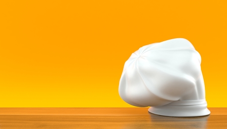 Chef's hat on orange background. 3d illustrationの写真素材