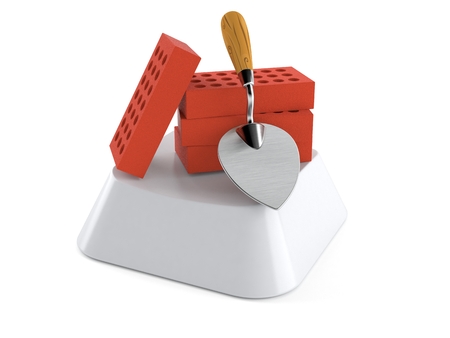 Trowel and bricks on computer key isolated on white background. 3d illustrationの写真素材