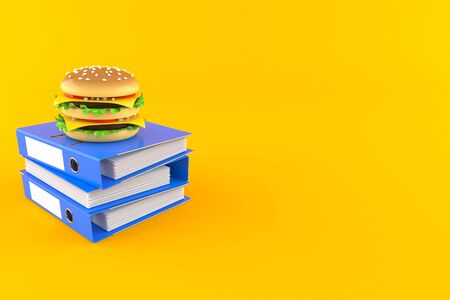 Cheeseburger with ring binders isolated on orange background. 3d illustrationの写真素材
