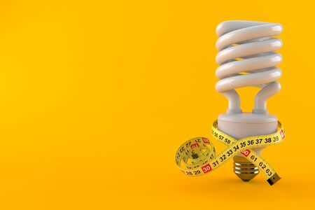 Light bulb cfl with centimeter isolated on orange background. 3d illustrationの写真素材