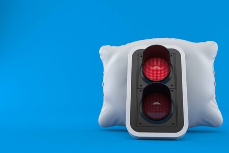 Red traffic light with pillow isolated on blue background. 3d illustrationの写真素材