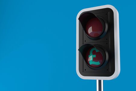 Green traffic light with pound currency symbol isolated on blue background. 3d illustrationの写真素材