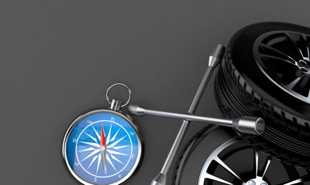 Compass with car tire and wrench on gray background. 3d illustrationの写真素材