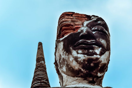 ancient remains of   sukhothai historical park Thai,statue in religion Thailand , are public domain ,no restrict in copy or use . This photo taken these conditionsの写真素材