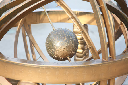 Antique brass armillary sphereの写真素材