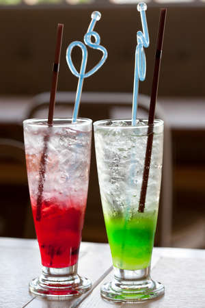 two glasses with cocktail and iceの写真素材