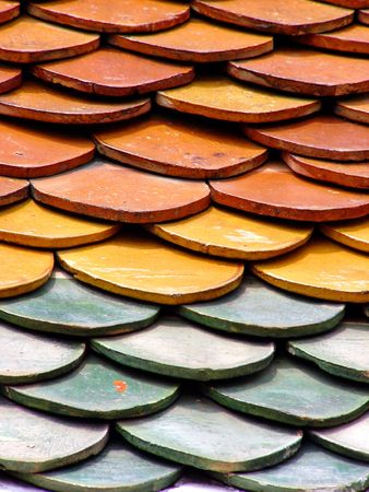 Tiles on a Thai temple roofの写真素材