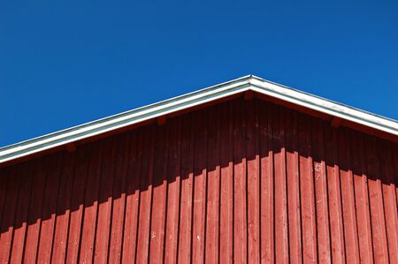 Wooden wall and roof of Finnish barnの写真素材