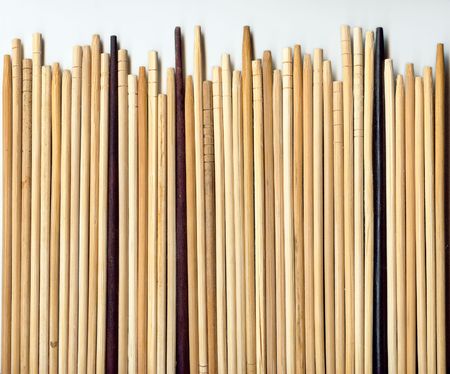 Background of row of wooden chopsticksの写真素材