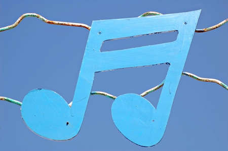 Metal cutout of musical symbol above a pubの写真素材