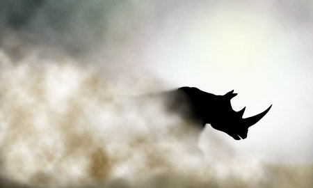 Editable vector illustration of a charging rhinoceros and dust cloud made using a gradient meshのイラスト素材