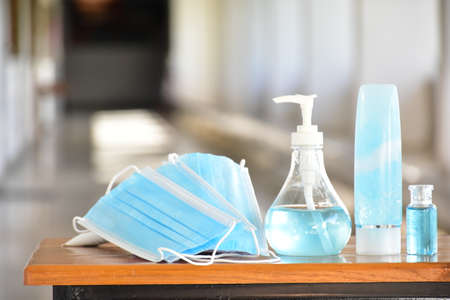 New normal, protective equipments; face mask, face shield, hand sanitizer, hand soap, alcohol spray, contton buds. Concept for protecting coronavirusの写真素材