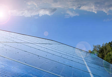 Photovoltaic system installed on the roof of the building, concept for using renewable and...