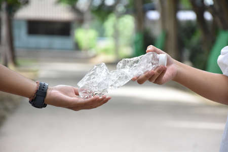 Twisted plastic bottles, concept for making smaller size before recyclying to reduce the pollution and global warming.の写真素材