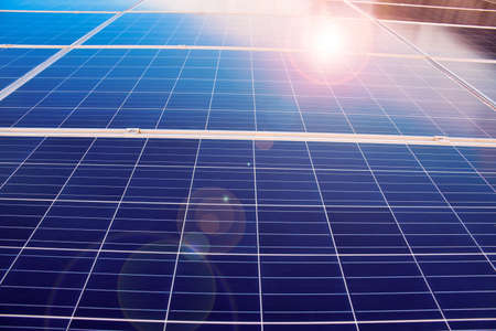 Photovoltaic on the roof of the building, concept for using sustainable energy from the sunlight.の写真素材