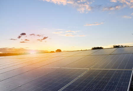 Solar cells panels on the roof of the building with landscape, skyscape, sustainable energy from the...