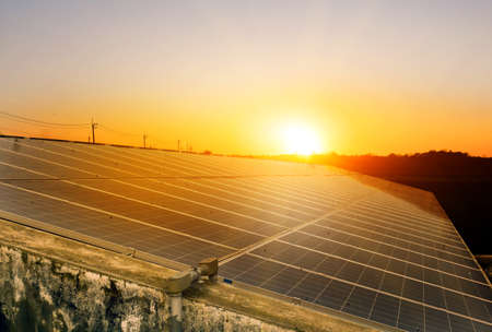 Solar roof with sunlight blurred background, concept for using the sustainable energy from the...