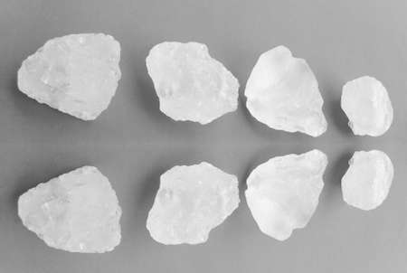 Alum cubes on gray background, concept for herb, bodycare, skincare, waterclear and protect armpit...
