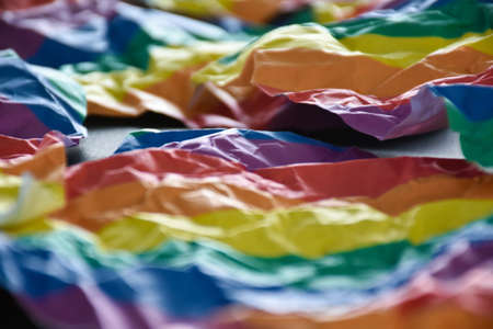 Closeup view of rainbow crumpled paper, soft and selective focus.