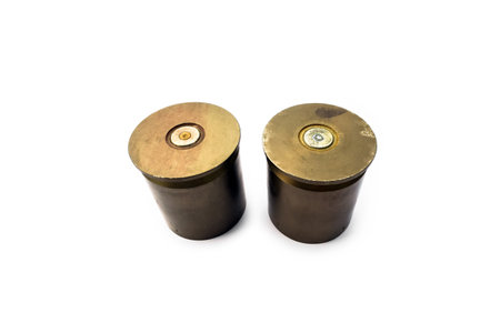 isolated used and old m203 bullet shells on white background. Soft and selective focus.