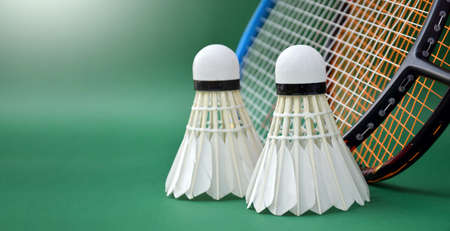 Cream White Badminton Shuttlecocks And Rackets On Green Floor In Indoor Badminton Court Copy Space の素材 Fy ストックフォトのamanaimages Plus