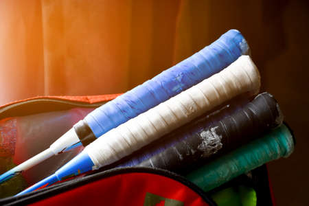Closeup view of badminton rackets which are in the badminton's bag, soft and selective focus on...