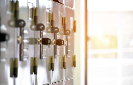 Metal filing cabinets for storing student supplies in classroom, soft and selective focus on black...