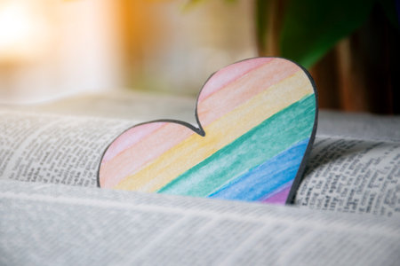 Colorful heart shape on a book. Valentine's day concept.の写真素材